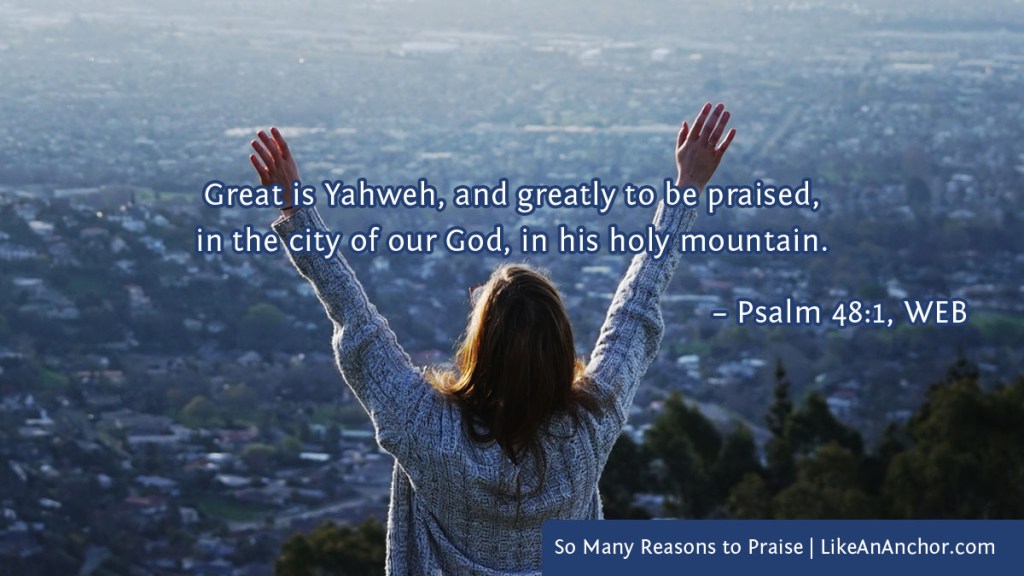 Image of a woman standing on a mountain with her arms raised in praise, overlaid with text from Psalm 48:1, WEB version: "Great is Yahweh, and greatly to be praised, in the city of our God, in his holy mountain."